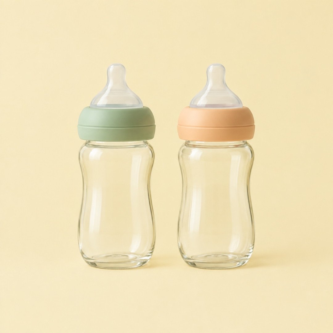 Pair of glass feeding bottles